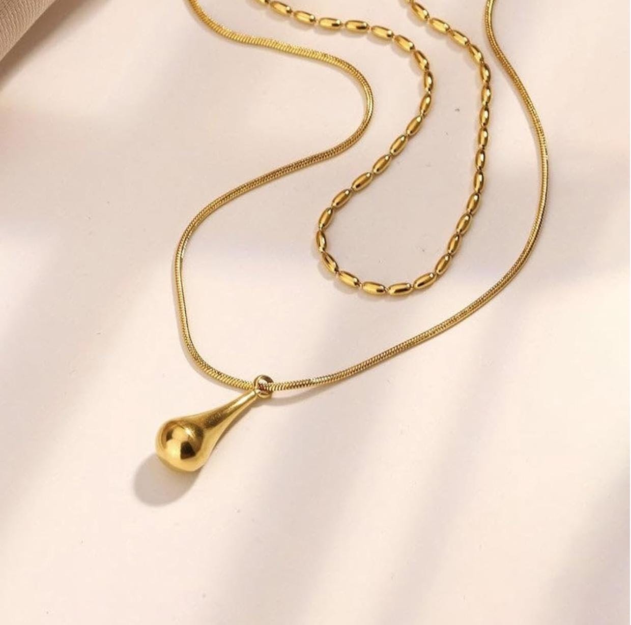 Elegant Gold-Plated Dual Layer Necklace with Teardrop Pendant
